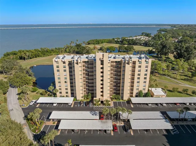 a view of city with ocean