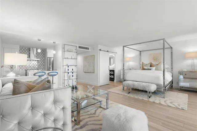 a living room with furniture and a table