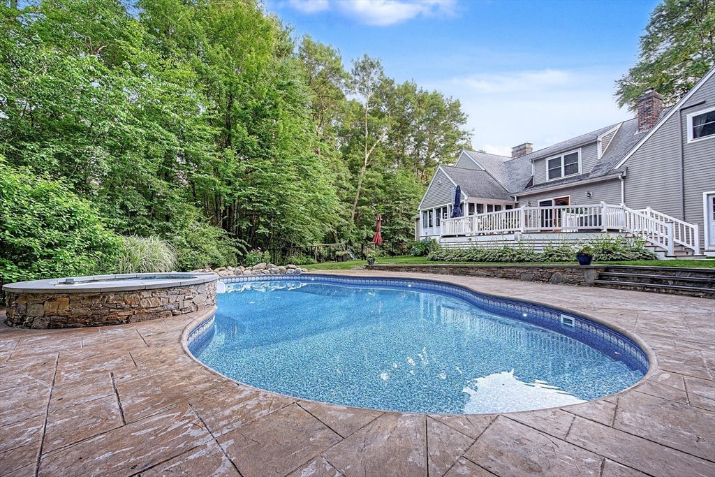 4 Dicarlo Road Hopkinton, MA 01748 - Photo 36 of 41 a view of swimming pool from a lounge chair