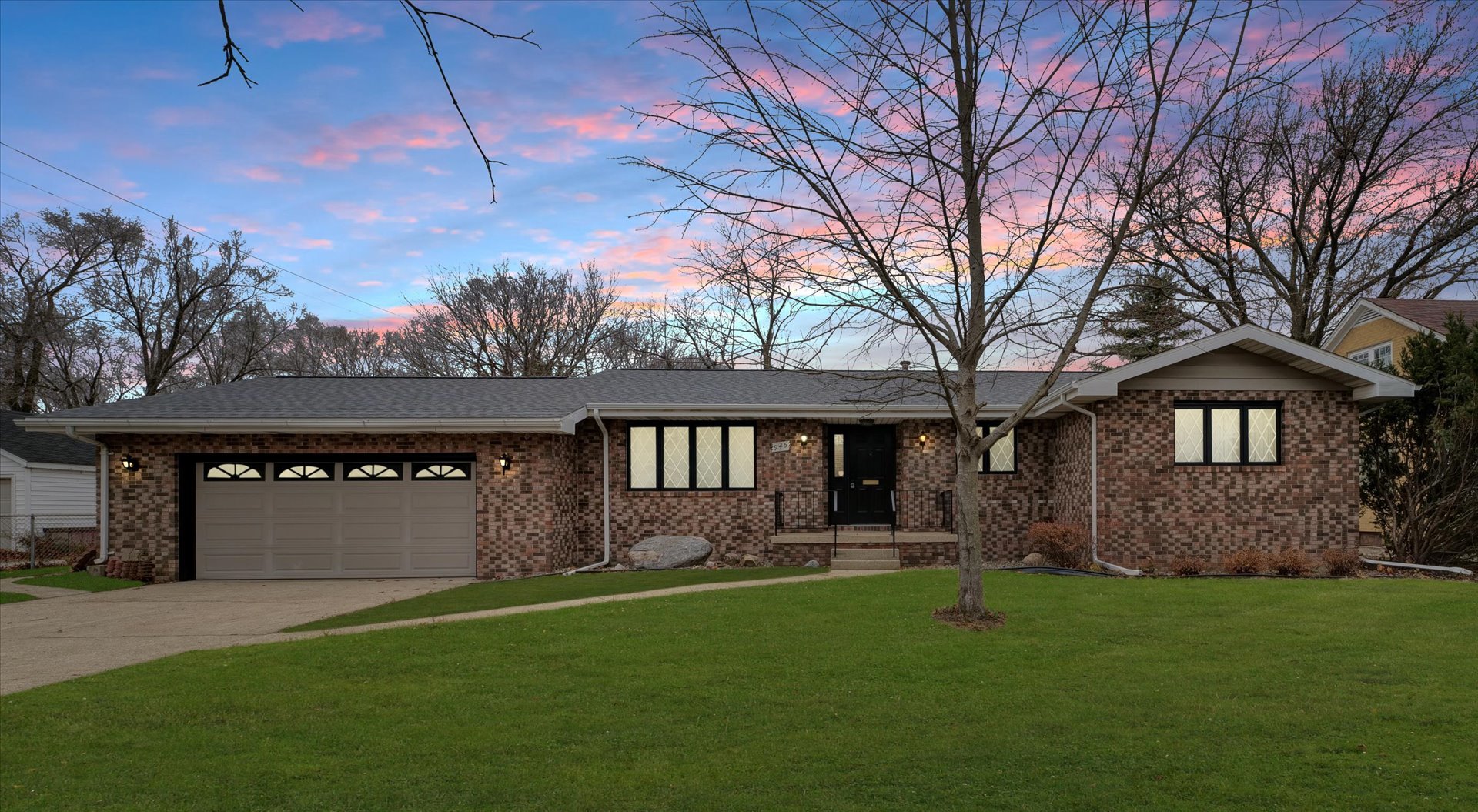 945 North Oakland Avenue Decatur, IL 62522 - Photo 1 of 49 a front view of a house with a garden and yard