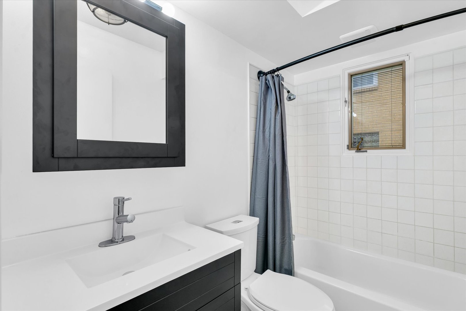 945 North Oakland Avenue Decatur, IL 62522 - Photo 21 of 49 a bathroom with a sink toilet and shower