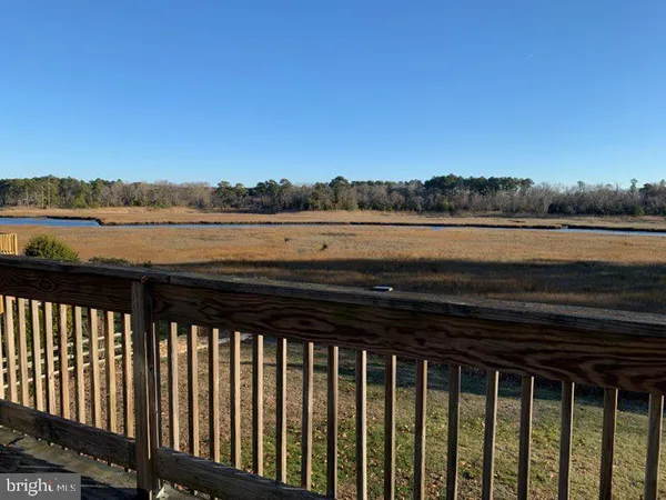 a view of a lake from a balcony