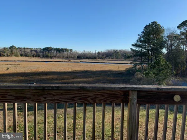 a view of a lake from a balcony