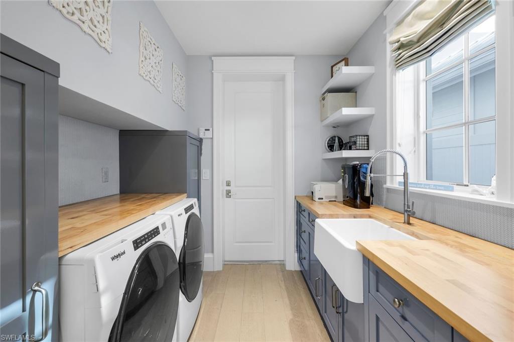 1463 2nd Avenue South Naples, FL 34102 - Photo 29 of 43 a storage room with washer and dryer