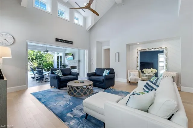 a kitchen with a sink cabinets and wooden floor