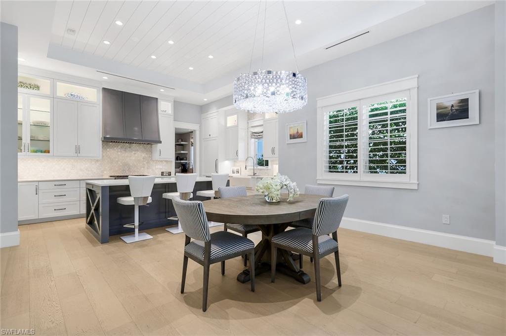 1463 2nd Avenue South Naples, FL 34102 - Photo 7 of 43 a view of a dining room with furniture window and outside view