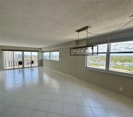 a view of a livingroom with furniture and window