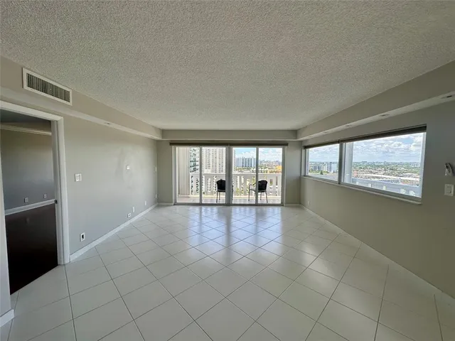 a bathroom with a sink a mirror and a toilet
