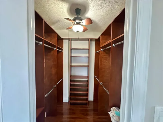 a view of a swimming pool with a table and chairs