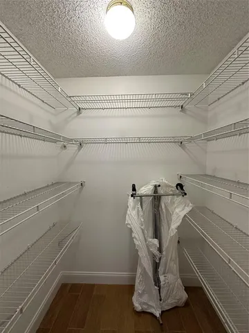 a view of a swimming pool with a table and chairs