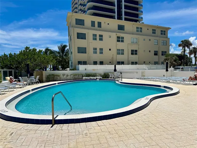 a view of a yard with an outdoor space