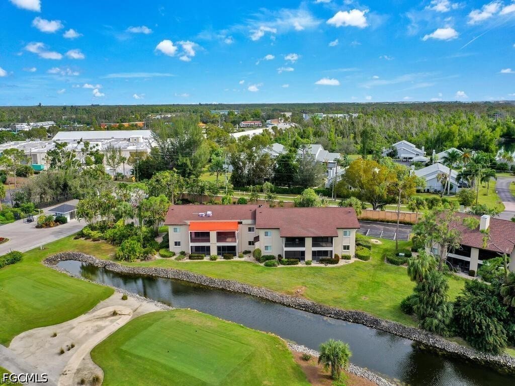 16560 Partridge Place Road, Unit 101 Fort Myers, FL 33908 - Photo 22 of 27 an aerial view of a house with a garden