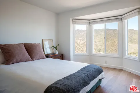 a view of an outdoor sitting area with furniture