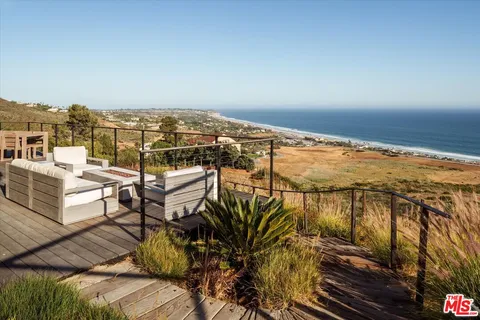 a view of outdoor space with seating area