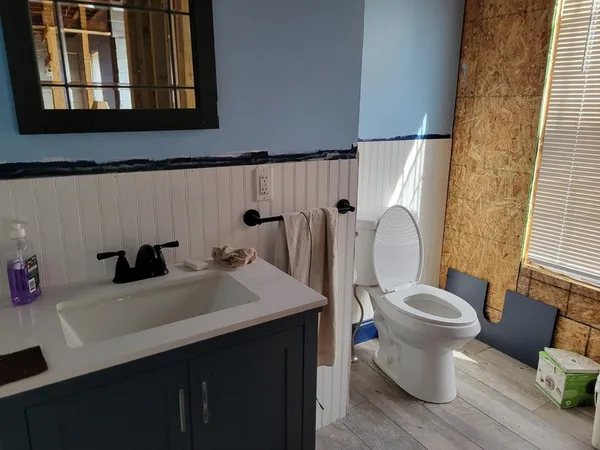 a room with furniture and a book shelf