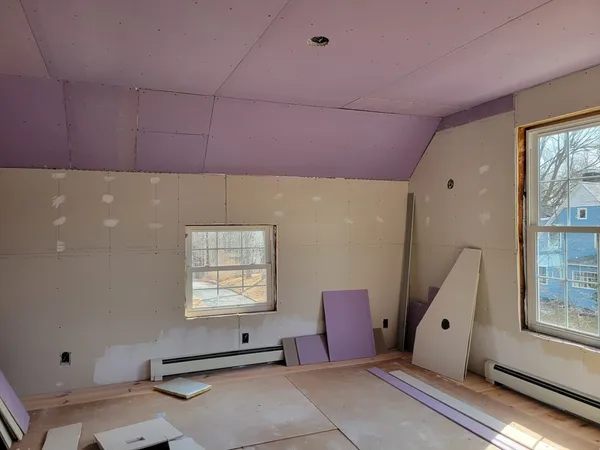 a view of walk in closet with large window