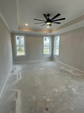 a bathroom with a granite countertop sink and vanity