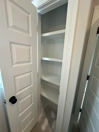 a bathroom with a shower and a toilet