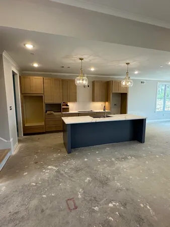 a utility room with a sink a washer and dryer