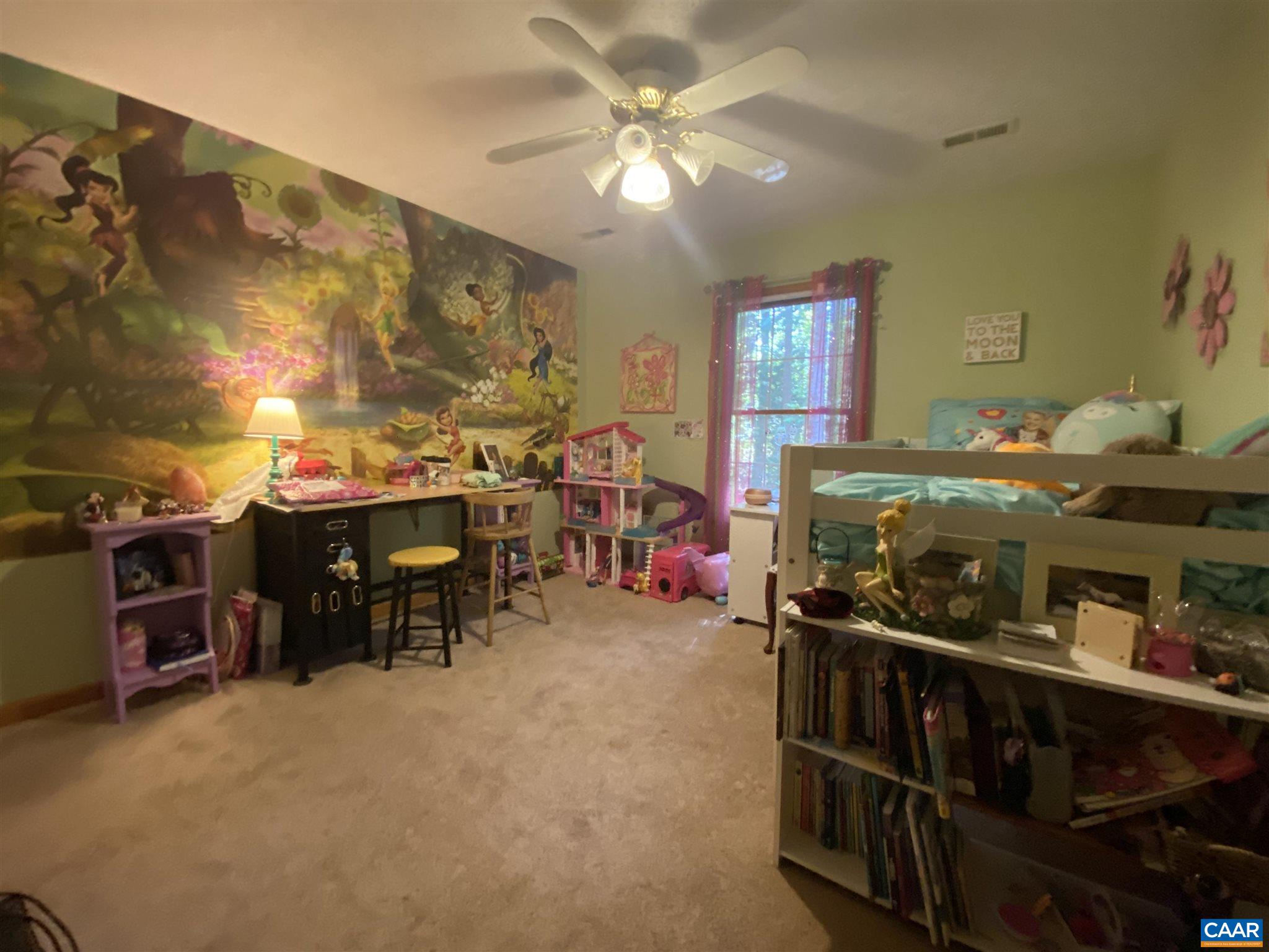 11 Stonefield Road Palmyra, VA 22963 - Photo 23 of 27 a room with furniture a chandelier and a fireplace
