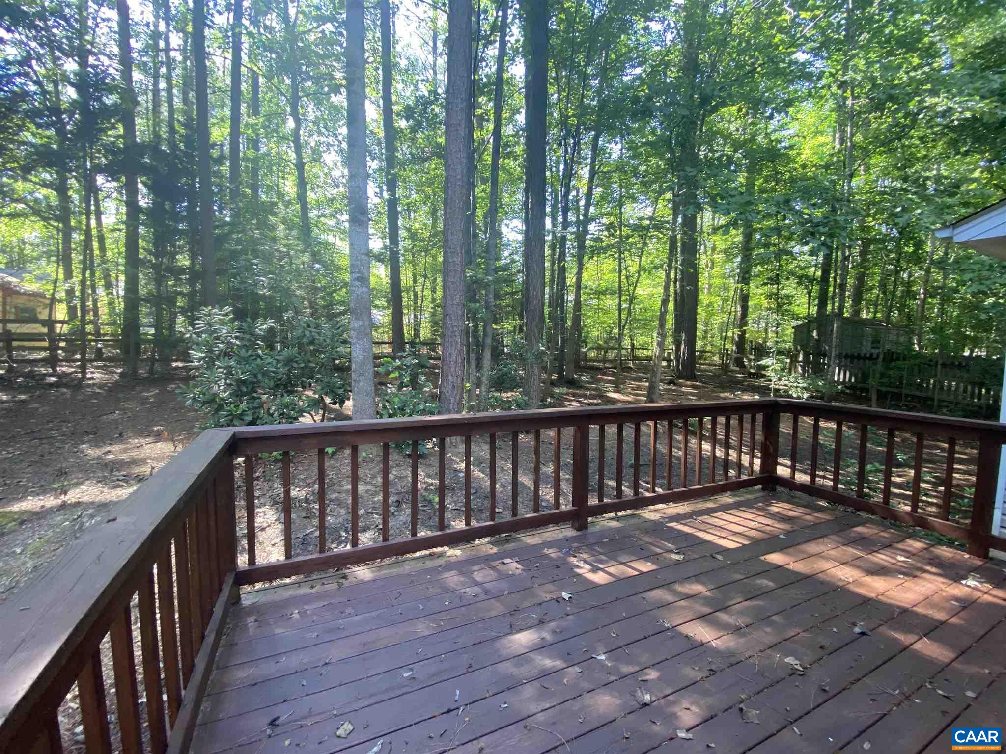11 Stonefield Road Palmyra, VA 22963 - Photo 24 of 27 a balcony with wooden floor and fence