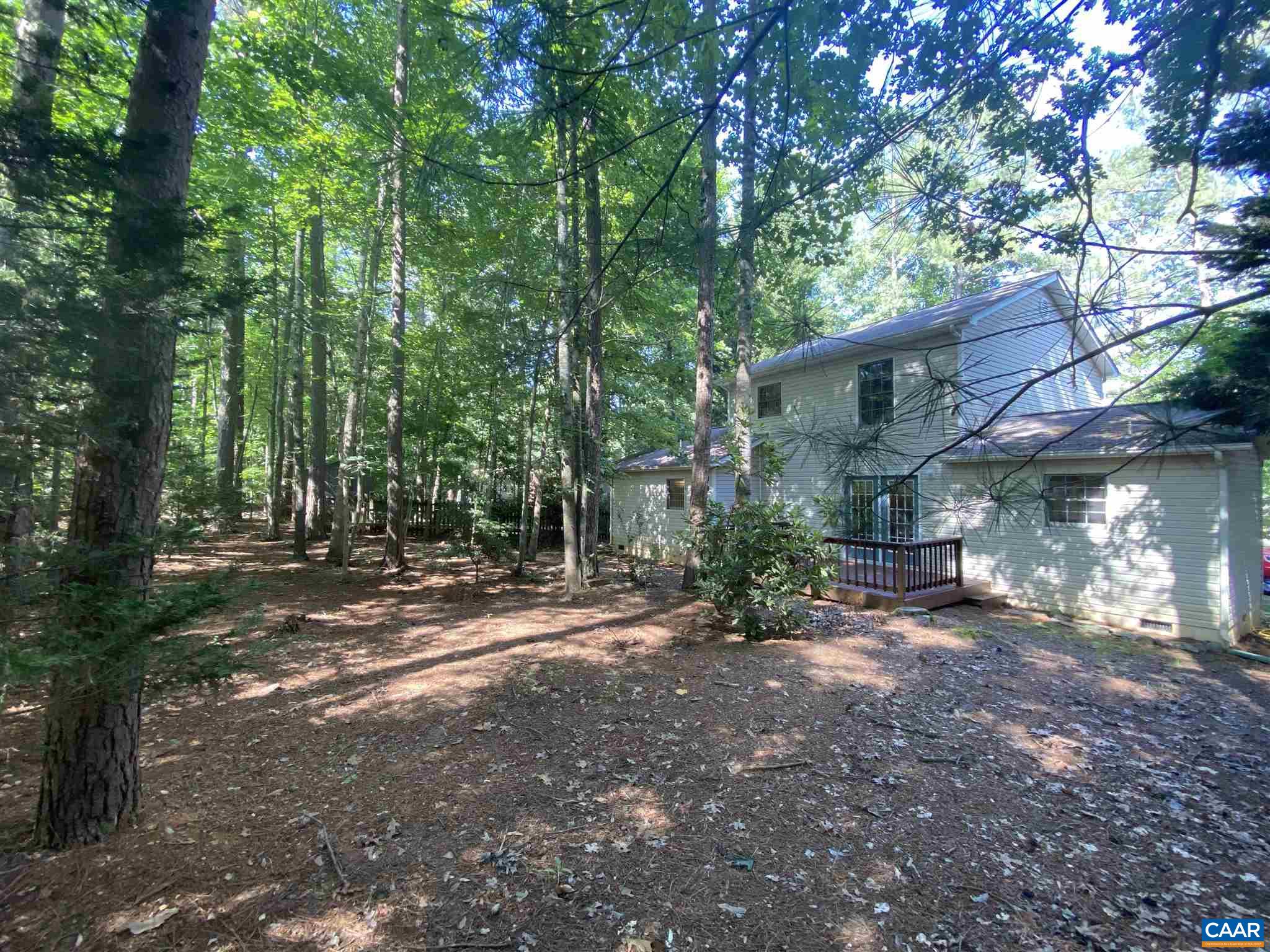 11 Stonefield Road Palmyra, VA 22963 - Photo 25 of 27 a view of a tree in the middle of a yard