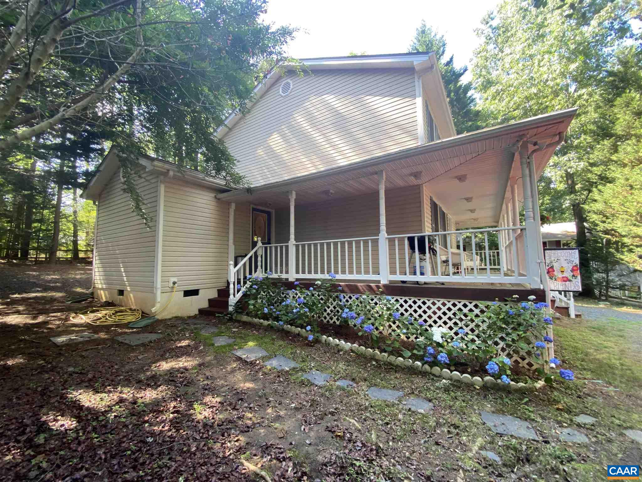 11 Stonefield Road Palmyra, VA 22963 - Photo 26 of 27 a front view of a house with a garden