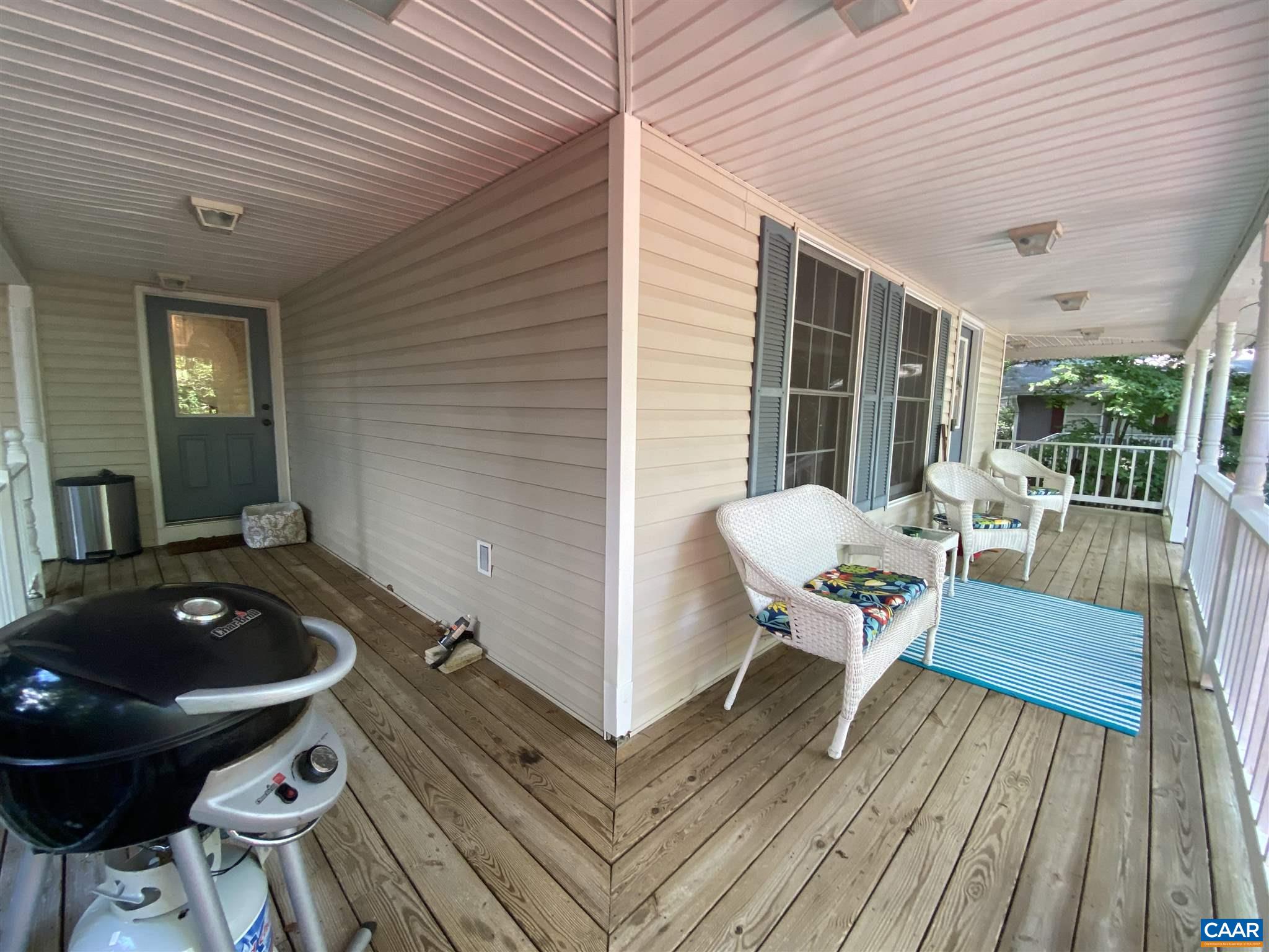 11 Stonefield Road Palmyra, VA 22963 - Photo 3 of 27 a balcony with furniture and wooden floor