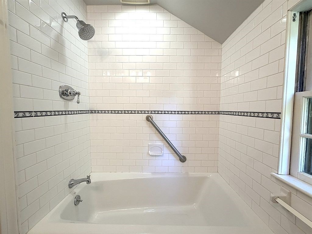 115 Parker Road Wellesley, MA 02482 - Photo 13 of 21 a bathroom with a bathtub and shower