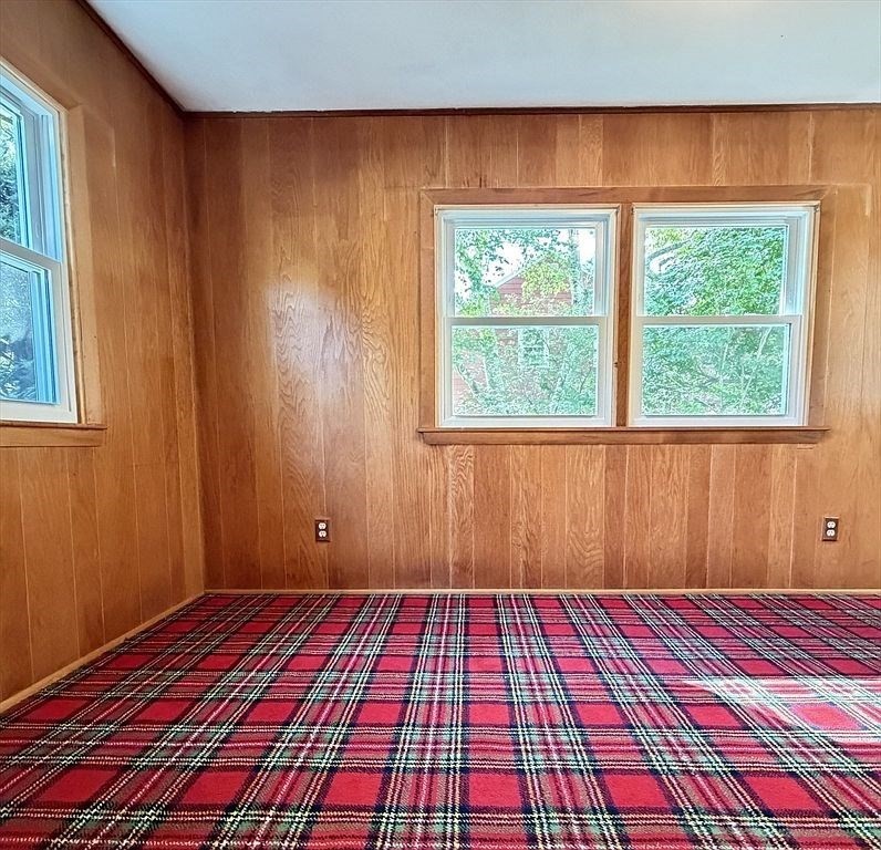 115 Parker Road Wellesley, MA 02482 - Photo 17 of 21 a view of a room with wooden floor and a window