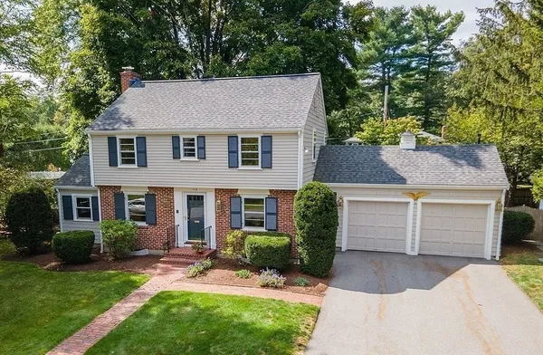 front view of a house with a yard