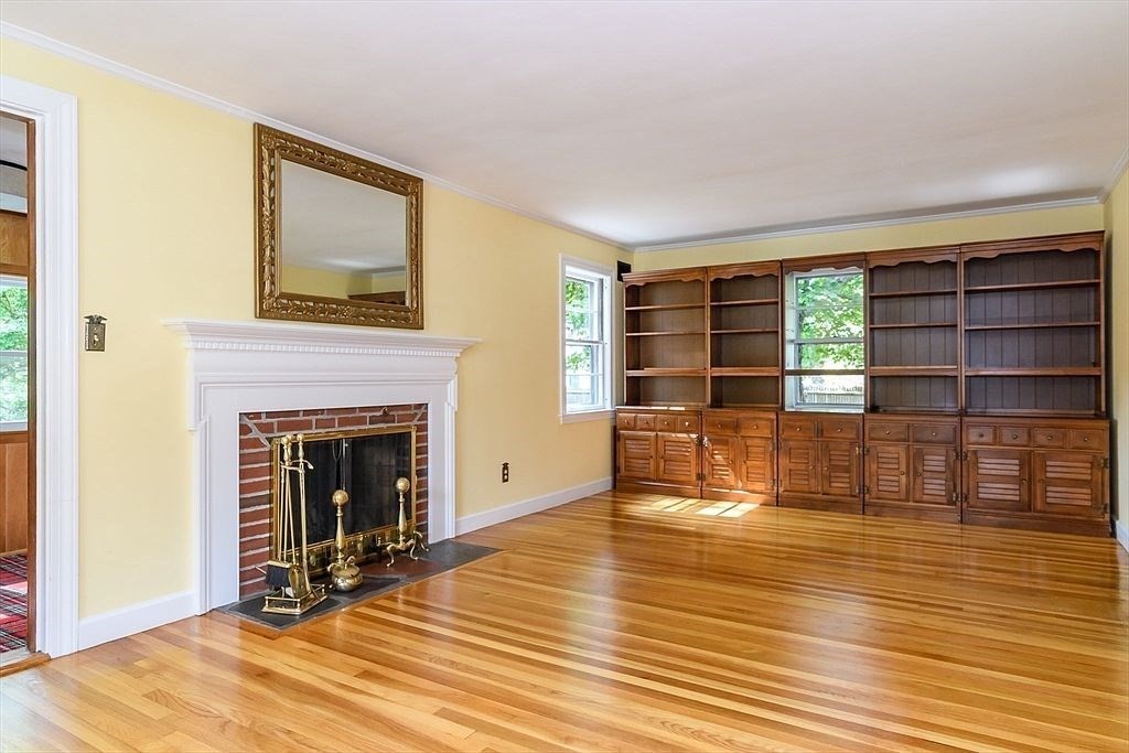 115 Parker Road Wellesley, MA 02482 - Photo 4 of 21 a living room with furniture and a fireplace