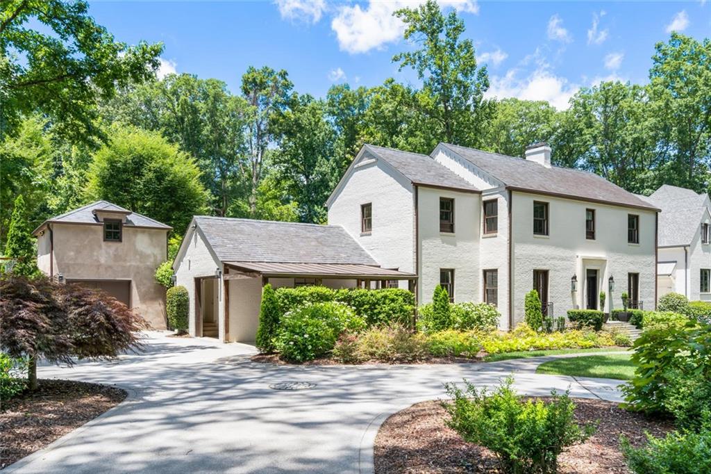 3748 Vermont Road Northeast Atlanta, GA 30319 - Photo 1 of 1 Beautiful brick exterior with attached garage, carport and detached one-car garage with guest suite above.