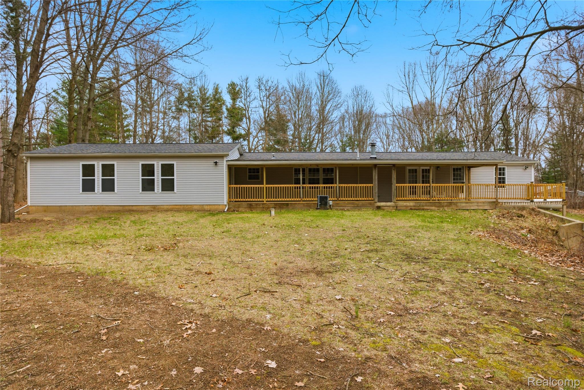 5350 List Road Grass Lake, MI 49240 - Photo 56 of 71 View of front of property featuring a porch and a front yard