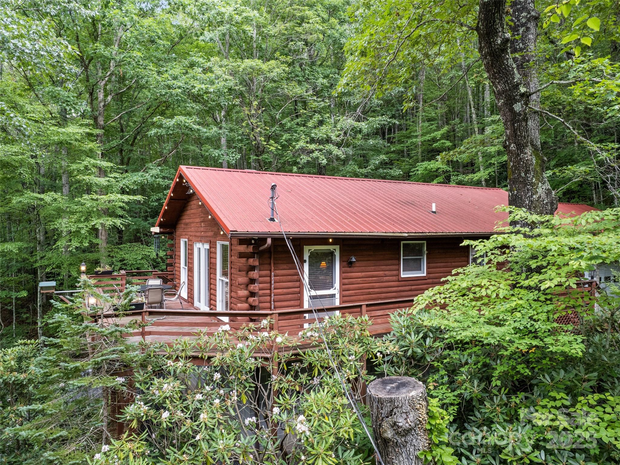 4231 Bald Creek Road Clyde, NC 28721 - Photo 20 of 23 a front view of a house with a yard