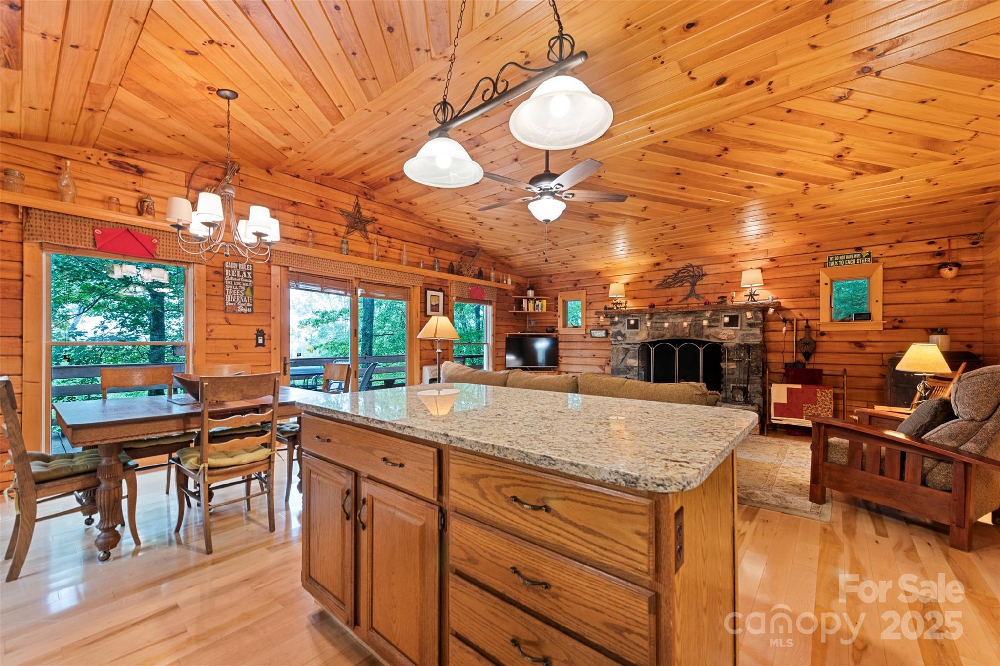4231 Bald Creek Road Clyde, NC 28721 - Photo 7 of 23 a kitchen with stainless steel appliances granite countertop a sink and cabinets