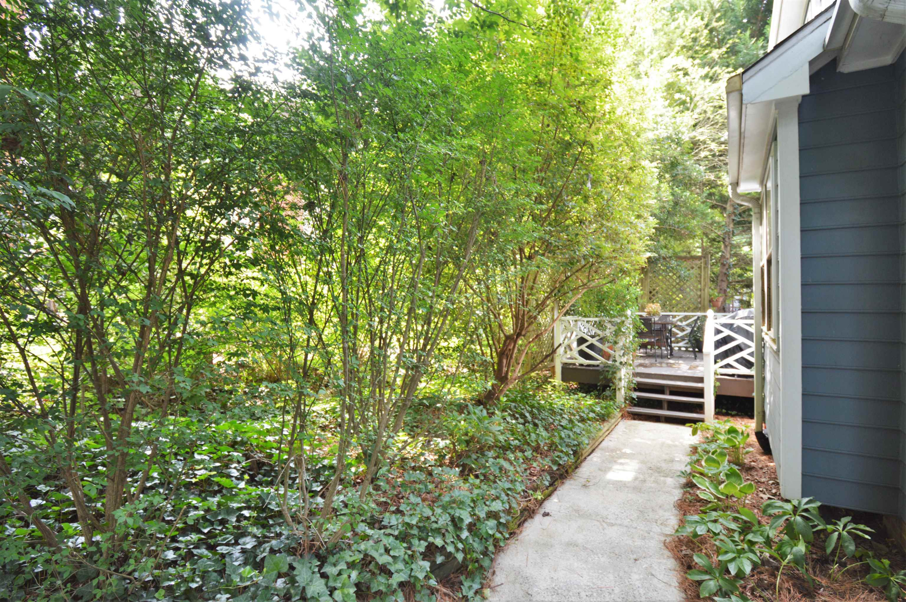 7008 Sandringham Drive Raleigh, NC 27613 - Photo 32 of 52 Back Walk