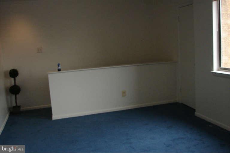 3182 Berry Road Northeast, Unit 28 Washington, DC 20018 - Photo 13 of 13 Living Room - Another View of Large Living Room