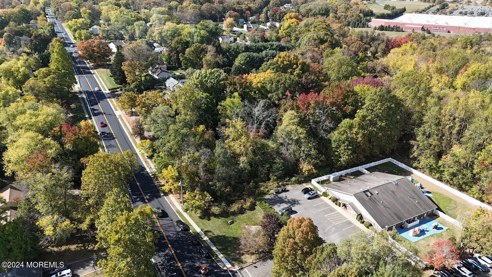 280 Schanck Road Freehold, NJ 07728 - Photo 14 of 19 an aerial view of a house with a yard