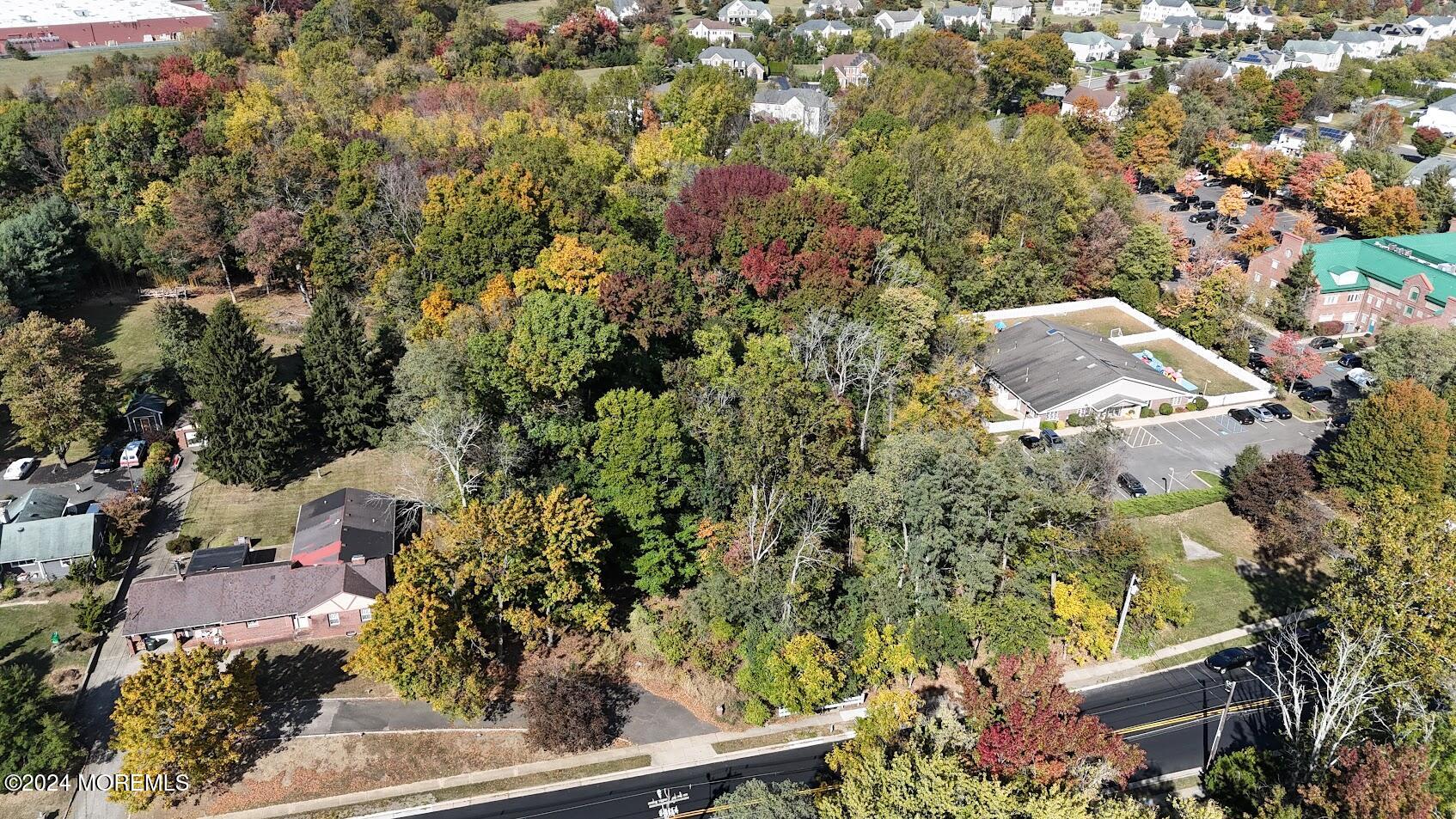 280 Schanck Road Freehold, NJ 07728 - Photo 4 of 19 an aerial view of residential house with outdoor space and trees all around