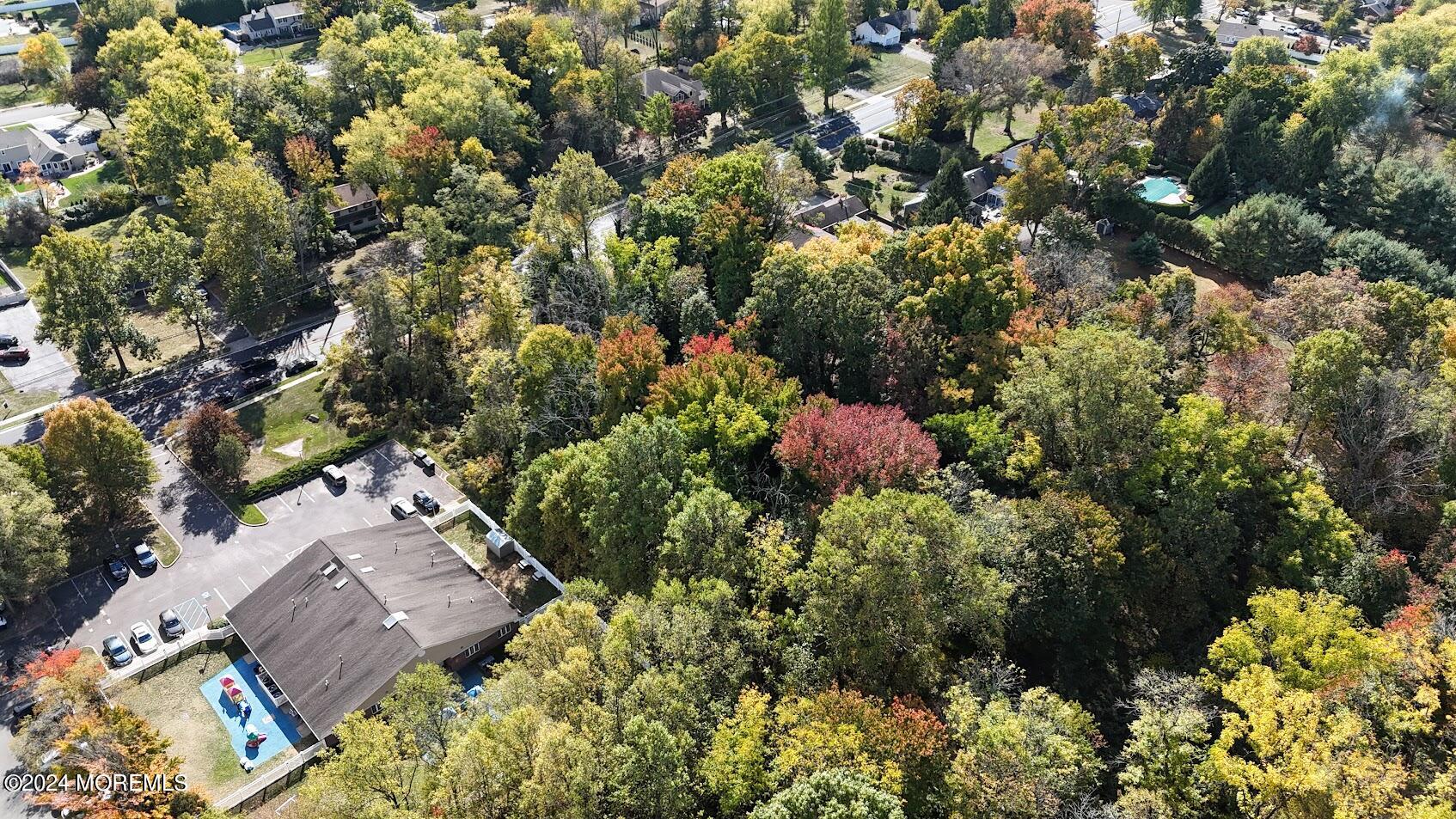 280 Schanck Road Freehold, NJ 07728 - Photo 8 of 19 a view of a house with a yard and garden