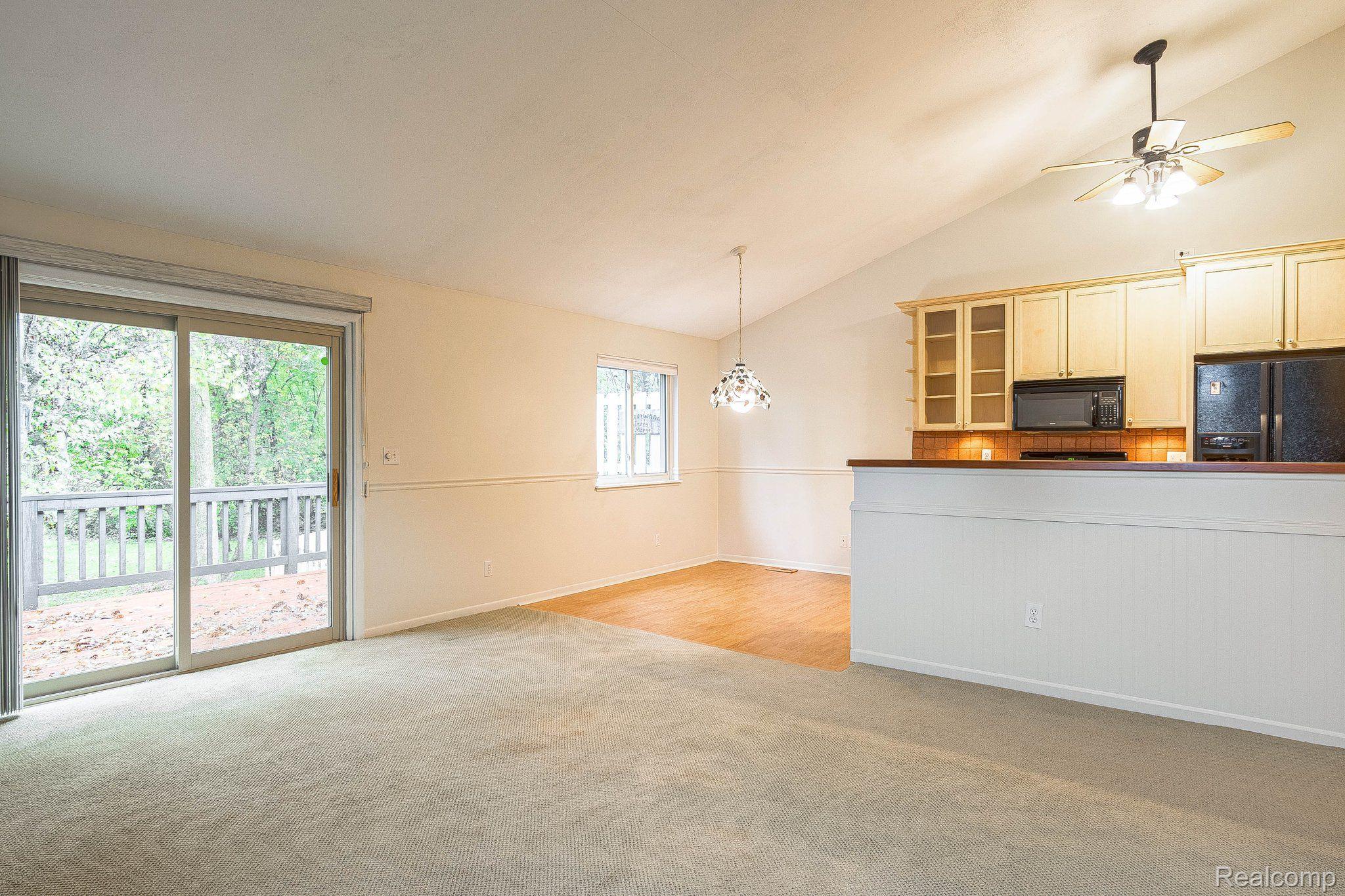 205 George Street Flushing, MI 48433 - Photo 10 of 40 Family room w/access to the deck