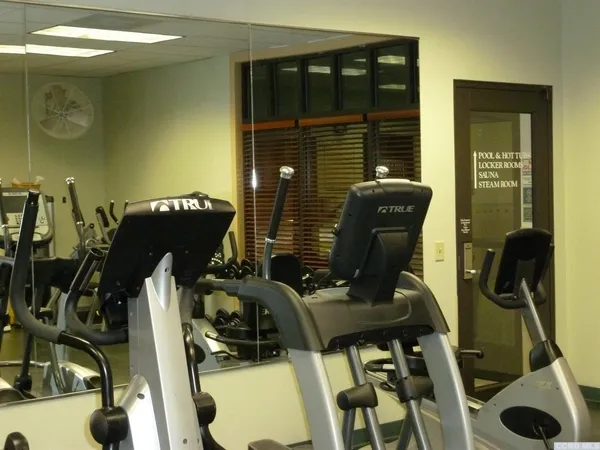 a view of a room with gym equipment