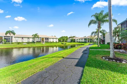 a view of a lake with a garden