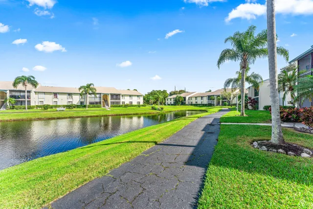 a view of a lake with a garden
