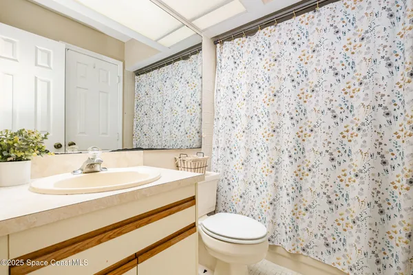 a bed room with a bed and a couch