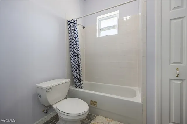 a bathroom with a sink and toilet
