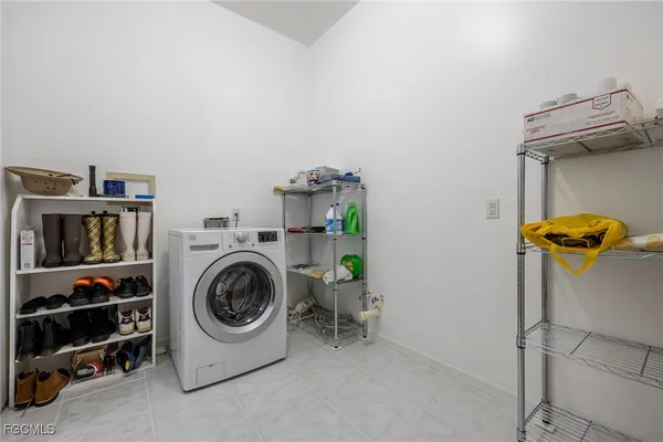 a bathroom with a shower and mirror