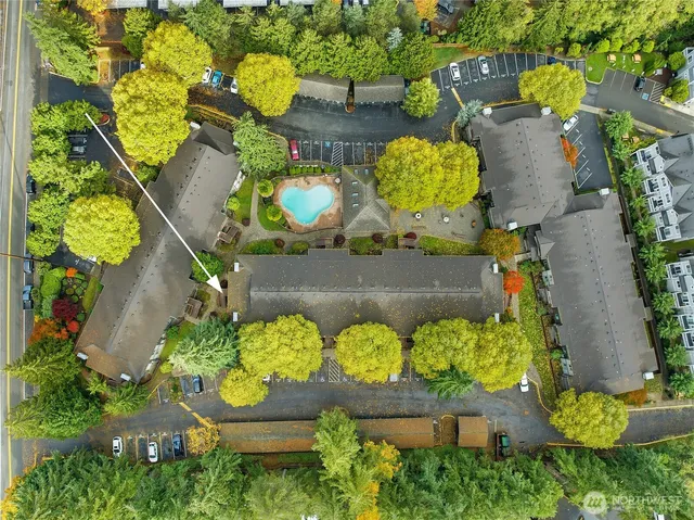 an aerial view of a house a yard and a fireplace