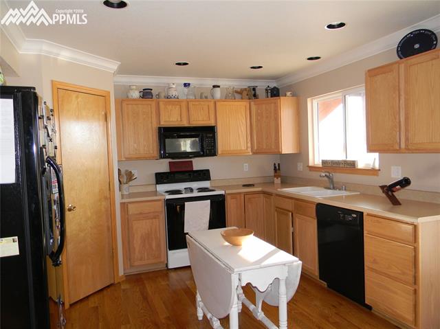 8516 Saddleman Road Peyton, CO 80831 - Photo 8 of 32 Gallery Image 8